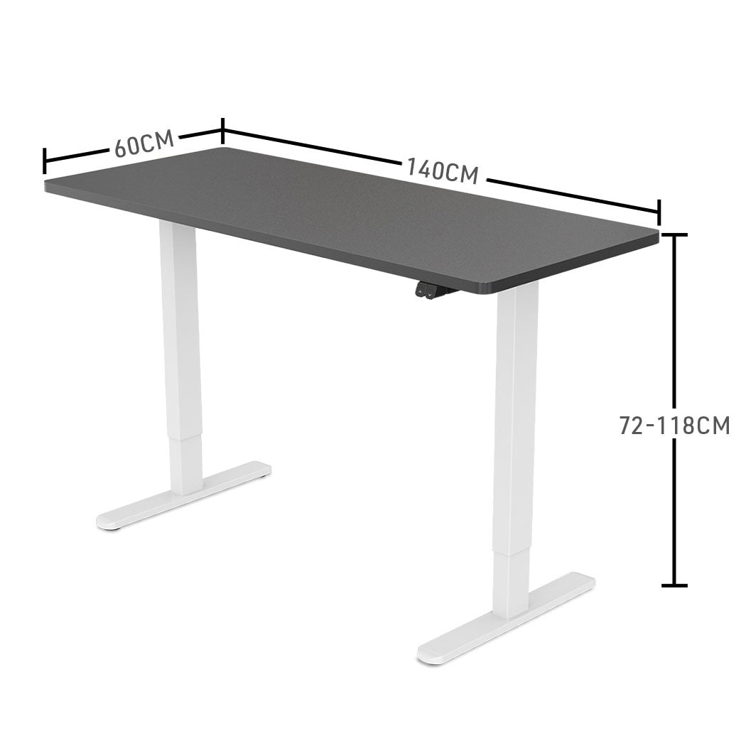 Fortia Sit To Stand Up Standing Desk, 140x60cm, 72-118cm Electric Height Adjustable, 70kg Load, Black/White Frame - Cosy Abode