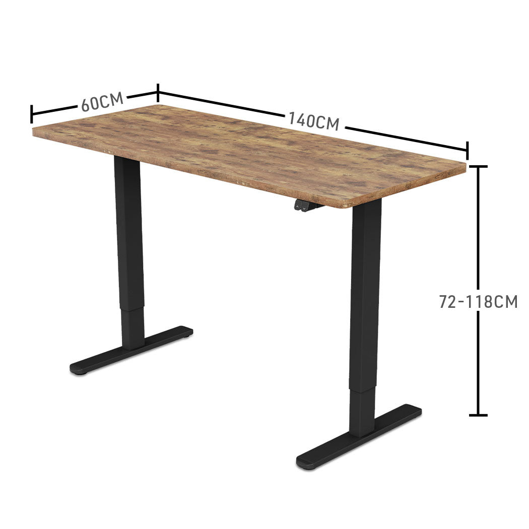 Fortia Sit To Stand Up Standing Desk, 140x60cm, 72-118cm Electric Height Adjustable, 70kg Load, Oak Style/Black Frame - Cosy Abode