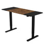 Fortia Sit To Stand Up Standing Desk, 140x60cm, 72-118cm Electric Height Adjustable, 70kg Rated, Oak Style/Black Frame - Cosy Abode
