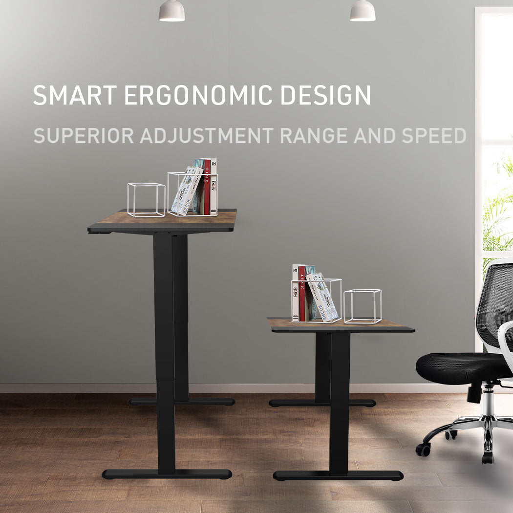 Fortia Sit To Stand Up Standing Desk, 140x60cm, 72-118cm Electric Height Adjustable, 70kg Rated, Oak Style/Black Frame - Cosy Abode