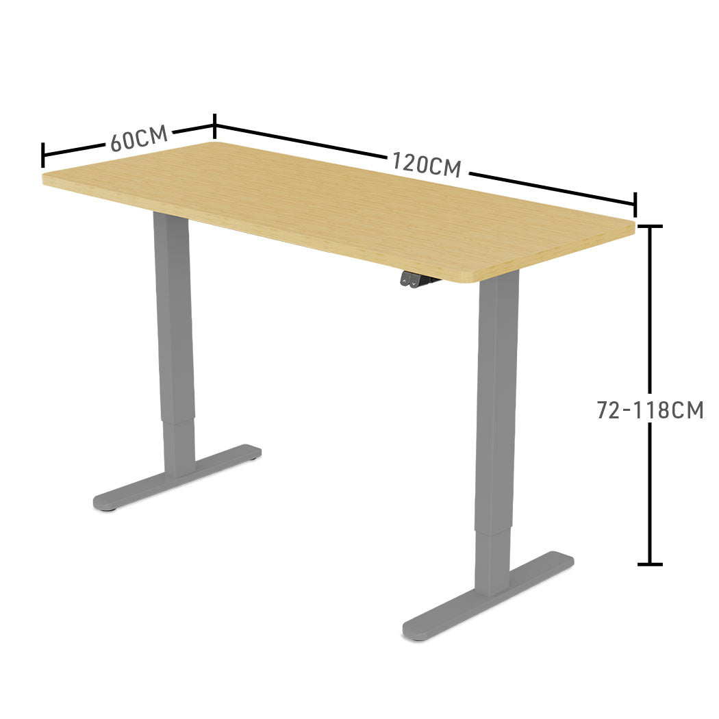 Fortia Sit To Stand Up Standing Desk, 120x60cm, 72-118cm Electric Height Adjustable, 70kg Load, White Oak Style/Silver Frame - Cosy Abode