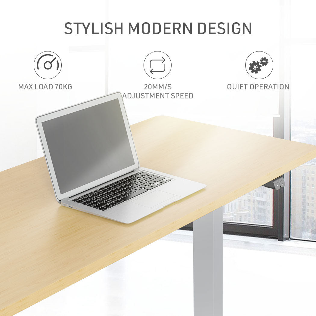 Fortia Sit To Stand Up Standing Desk, 120x60cm, 72-118cm Electric Height Adjustable, 70kg Load, White Oak Style/Silver Frame - Cosy Abode