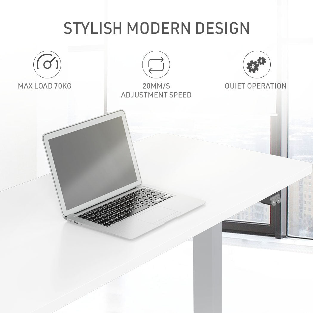 Fortia Sit To Stand Up Standing Desk, 140x60cm, 72-118cm Electric Height Adjustable, 70kg Load, White/Silver Frame - Cosy Abode