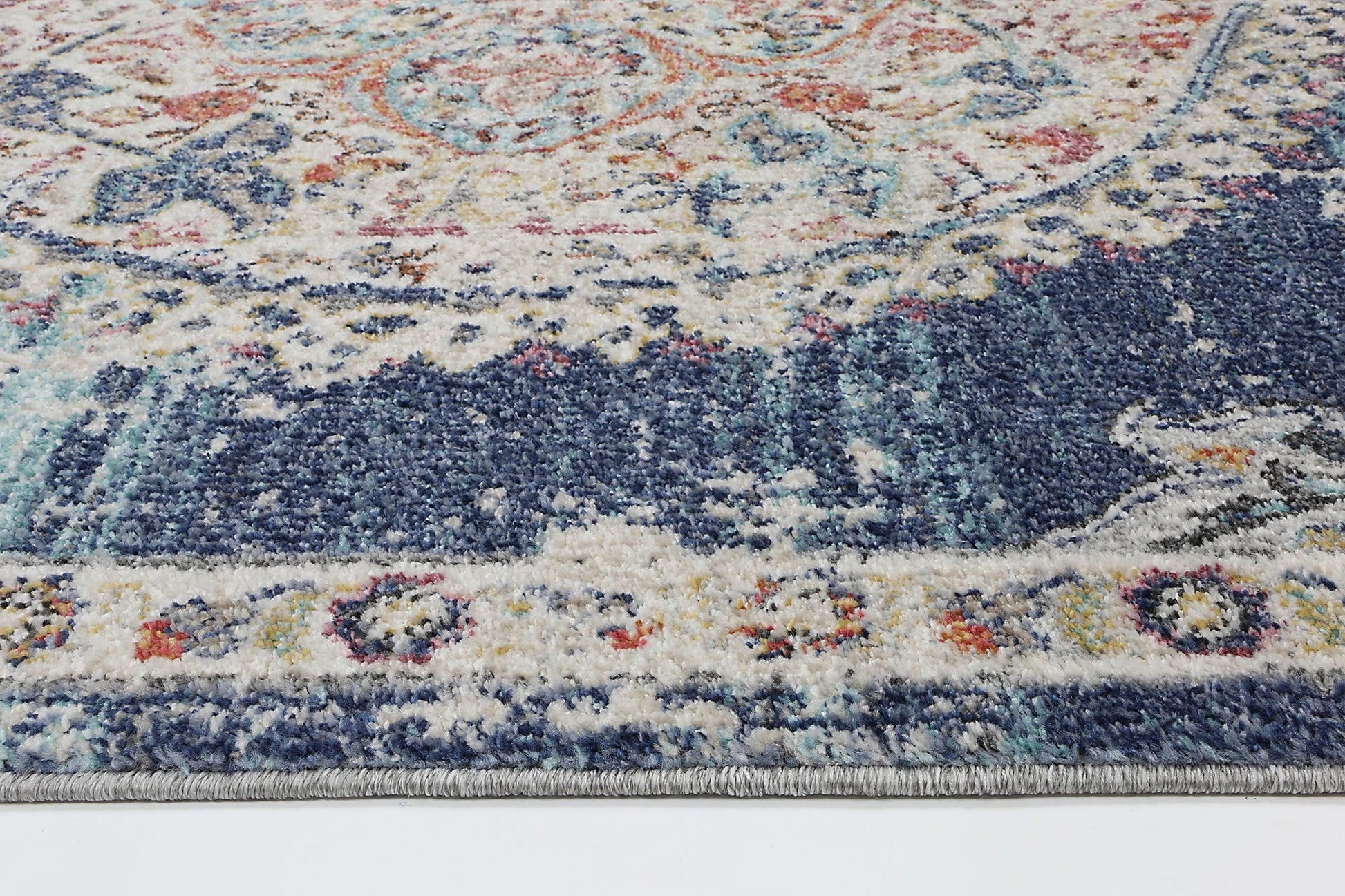 hollow-medalion-transitional-navy-multi-rug 80x300 - Cosy Abode